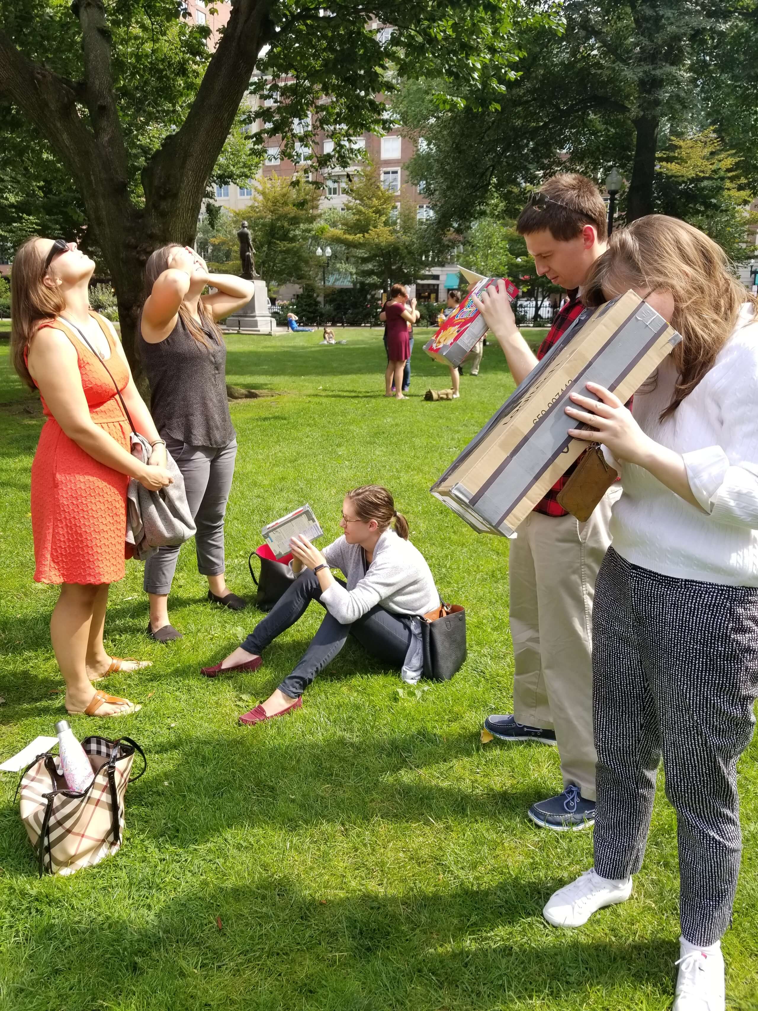 team members watching the eclipse outside