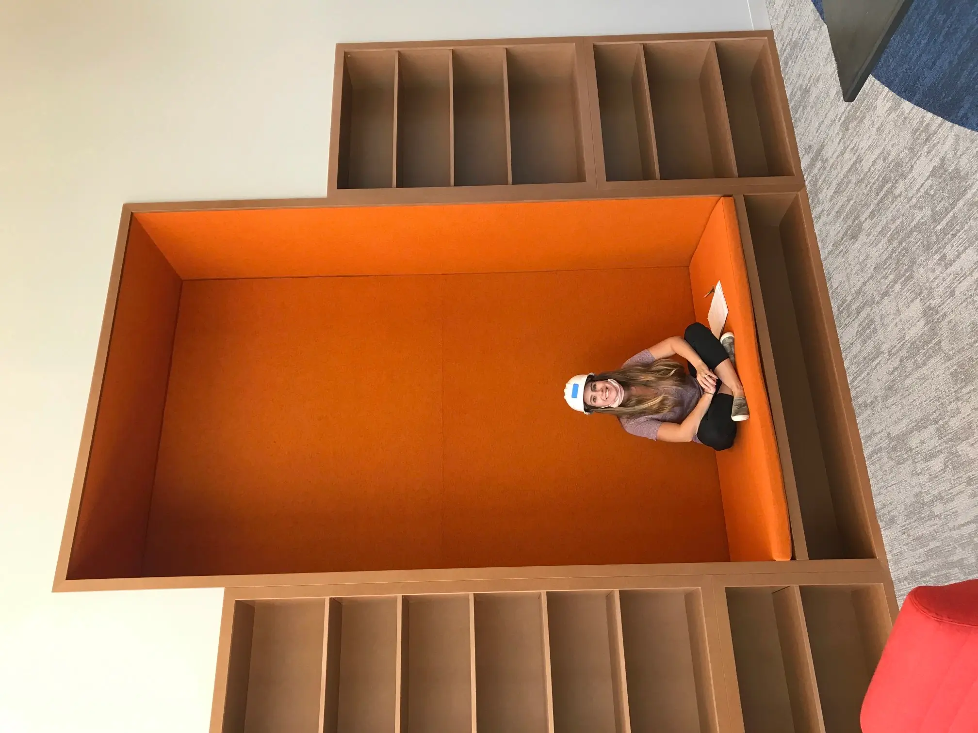 staff sitting in wall nook