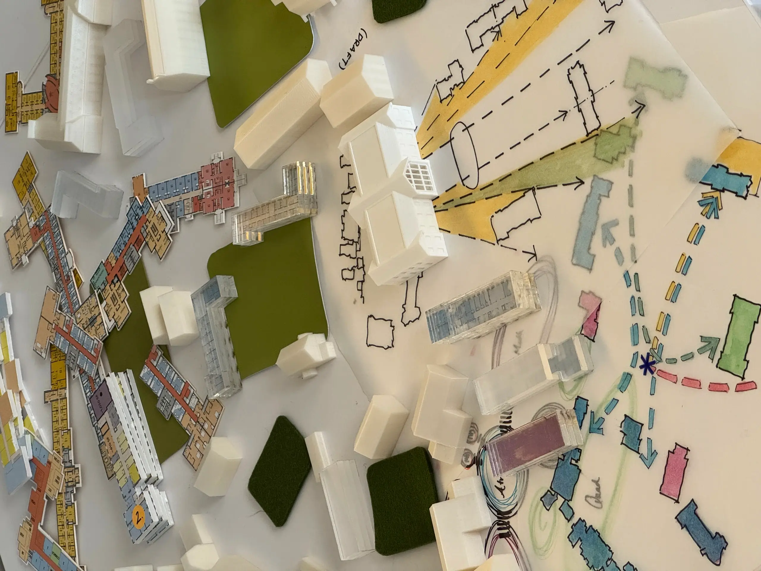 shot of planning materials, drawings, and models