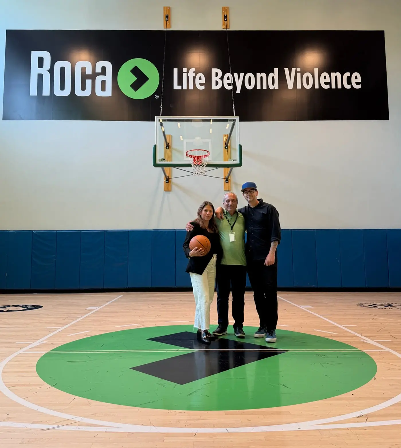 Victor, Liz and Joe on Roca's Basketball Court